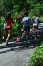 Rear View of Teenage girls running on path 2