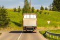 Rear view of truck stopping on the crossroad