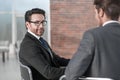 Rear view.two businessman sitting at his Desk Royalty Free Stock Photo