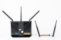 Rear view of  two Wi-Fi  routers, wireless devices with two  and three antennas on white background Royalty Free Stock Photo