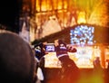 Rear view of man taking photo at Christmas Market in Strasbourg