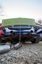 Rear view of a Vintage wedding car with just married sign and cans attached Royalty Free Stock Photo