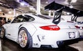 Rear view of a white Porsche 911 GT3 RSR at Hot Import Car Show in Honolulu, Hawaii