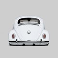 Rear View of White Retro Custom Volkswagen Beetle Bug, Kafer Car Isolated on Neutral Background. Royalty Free Stock Photo