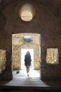 Rear view of woman in abandoned chapel