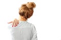 Rear view of a woman holding a shoulder. Royalty Free Stock Photo