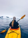 Rear view of woman kayaking at Antarctica