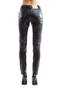 Rear view of woman legs in black leather trousers Royalty Free Stock Photo
