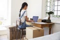 Rear View Of Woman Running Business From Home Dispatching Goods Royalty Free Stock Photo