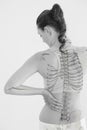 Rear view of woman suffering from muscle pain Royalty Free Stock Photo