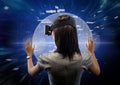 Rear view of woman using virtual reality headset Royalty Free Stock Photo