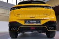 Rear view of yellow compact crossover (CUV) chinese car Dongfeng T5 EVO