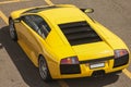 Rear view of a yellow luxury sportcar