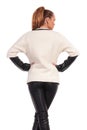 Rear view of a young fashion woman standing Royalty Free Stock Photo