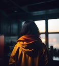 Rear view of young female person wearing yellow hoodie, generative ai