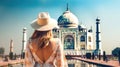 Rear view Young girl standing looks into the Taj Mahal mosque, Exciting journey through India