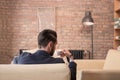 Rear view, young man drinking coffee bar espresso cup Royalty Free Stock Photo