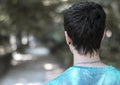 Rear view of a young man over nature background Royalty Free Stock Photo