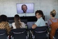 Business colleagues attending a video call in a conference room Royalty Free Stock Photo