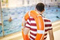 Swim instructor training his class