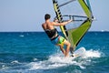 Rear view of young windsurfer Royalty Free Stock Photo