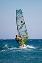 Rear view of young windsurfer Royalty Free Stock Photo