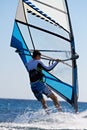 Rear view of young windsurfer Royalty Free Stock Photo