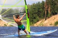 Rear view of young windsurfer close-up Royalty Free Stock Photo