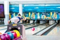 Rear view of a young woman bowling Royalty Free Stock Photo