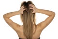 Rear view of a young woman scratching her head Royalty Free Stock Photo