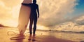 Woman surfer with white surfboard on a beach Royalty Free Stock Photo