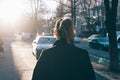 Rear view of young woman wearing black coat Royalty Free Stock Photo