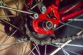 Rear wheel of a bicycle and chain. Abstract background on the theme of sports, bike maintenance, travel outdoors