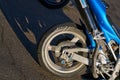 Rear wheel of blue sport motorcycle