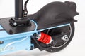 Rear wheel electric scooter and shock absorber