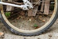 The rear wheel flat Tire of the bicycle Royalty Free Stock Photo