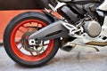 Rear wheel of modern sports road motorcycle Royalty Free Stock Photo