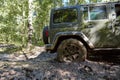 Rear wheel of a 4WD bogged down in soft mud