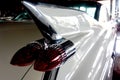 Rear wing of a white 1959 retro car closeup Royalty Free Stock Photo