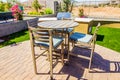 Rear Yard Setting With High Patio Table & Chairs With Cushions