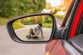 Rearview mirror with a man hit by a car Royalty Free Stock Photo