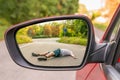 Rearview mirror with a man hit by a car Royalty Free Stock Photo