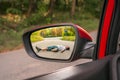 Rearview mirror with a man hit by a car Royalty Free Stock Photo