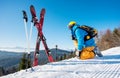 Skier resting on top of the mountain Royalty Free Stock Photo