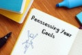 Reassessing Your Goals inscription on the piece of paper Royalty Free Stock Photo