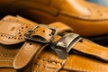 reattaching a shoe buckle onto a leather strap Royalty Free Stock Photo