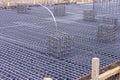 Rebar. Its surface is often deformed to promote a better bond with the concrete. The most common type of rebar is carbon steel, ty Royalty Free Stock Photo