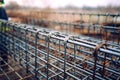 Rebar steel bars, reinforcement concrete bars with wire rod used in foundation of construction site Royalty Free Stock Photo