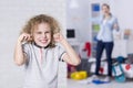 Rebellious boy covering his ears Royalty Free Stock Photo