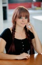 Rebellious teenager girl with red hair at home Royalty Free Stock Photo